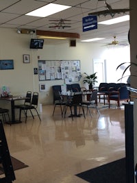 a room with a table and chairs