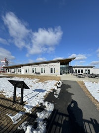 a 360 degree view of a building with snow on the ground