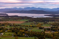 a view of a lake with mountains in the background