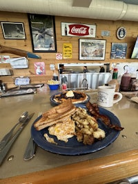 a plate of food on a table in a restaurant
