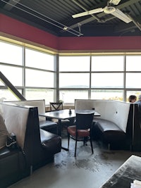 a room with a table and chairs
